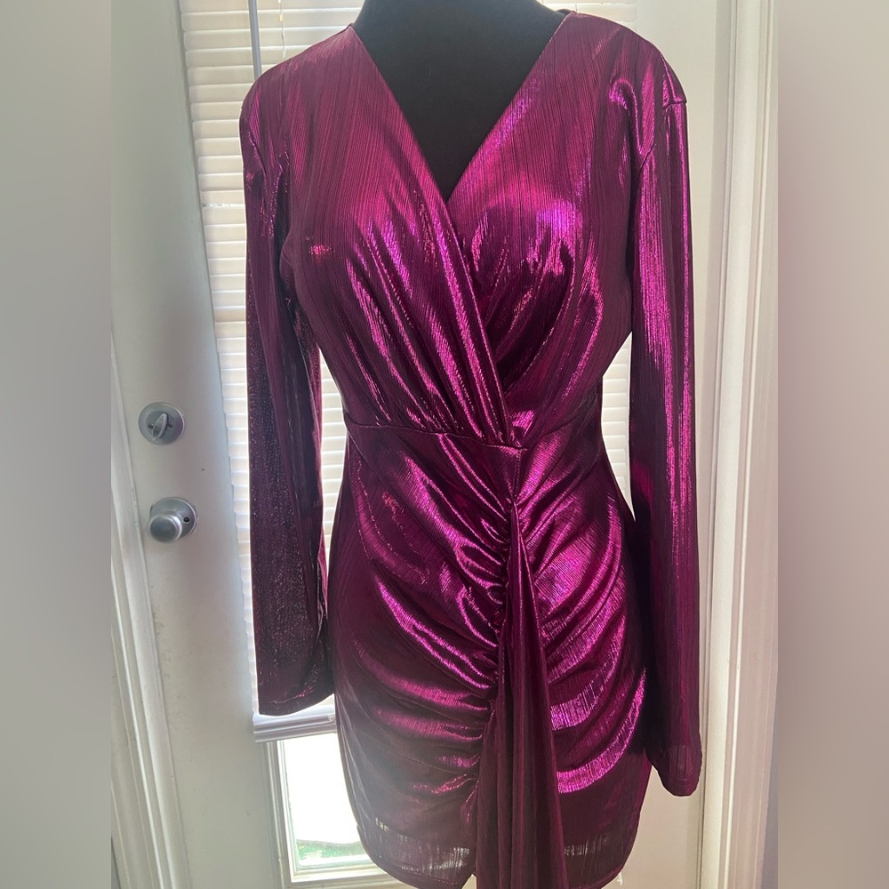 Purple fitted dress. Perfect for a cocktail party.